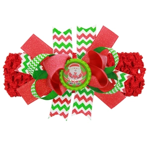 Weihnachts-Baby-Stirnband mit rotem Häkelband und festlicher Weihnachtsmann-Schleife