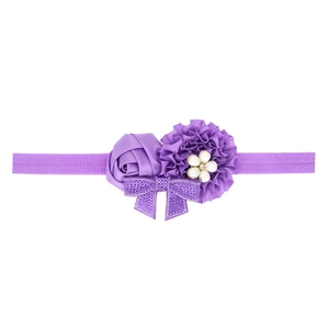 Sparkly sequin rose and mesh bow baby headband with elastic fabric and shiny purple rhinestones