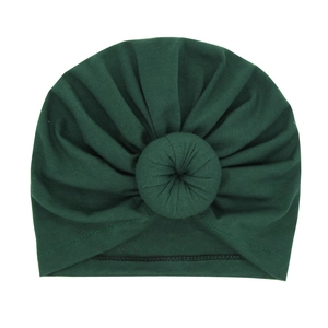 Deep green newborn donut knot turban hat made of soft elastic knitted fabric