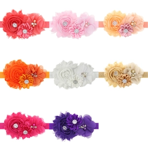Bandeaux élastiques pour bébés avec fleurs artisanales et strass brillants en huit couleurs