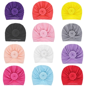 Set of 12 multi-color baby donut turbans in breathable and stretchy cotton fabric