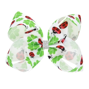 Barrette à cheveux Saint-Patrick avec trèfles verts et détails en strass brillants