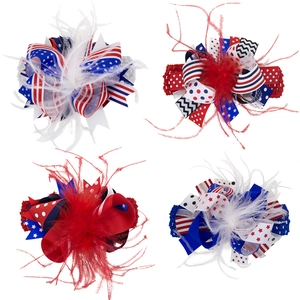 Detail of Independence Day hair accessories with red, white, and blue ribbons and feathers