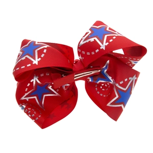 Nœud pour cheveux fête nationale rouge avec étoiles bleues et paillettes pour filles