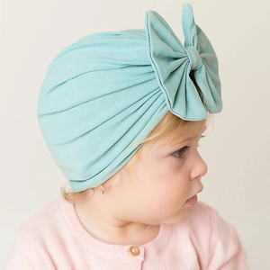 Baby bow knot beanie in light blue elastic knit cotton, soft newborn turban headwear