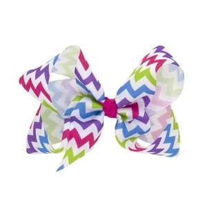 Grosse boucle de cheveux pour fille avec motif chevron coloré sur ruban blanc