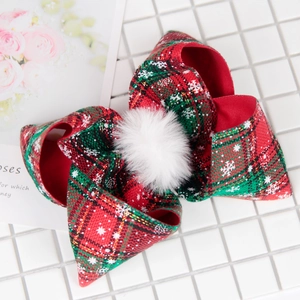 Weihnachtliche Haarspange mit großer karierter Schleife, Schneeflocken und weißem Plüschball