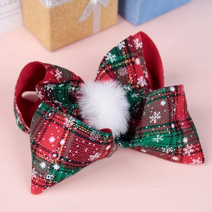 Weihnachts-Haarclip mit rot-grüner Karo-Schleife und weißen Schneeflocken-Mustern