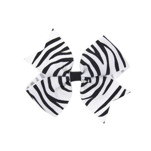 Barrette à nœud papillon zébré en ruban gros-grain pour filles avec motifs noir et blanc vifs