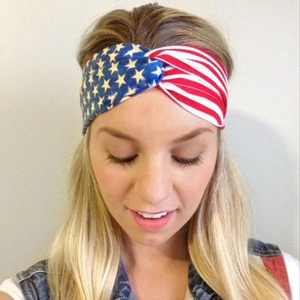 Front view of knotted headband with American flag stars and stripes pattern on a model