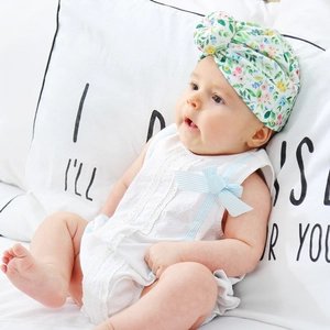Floral print baby turban hat with a white textured lace romper for newborn infant girls