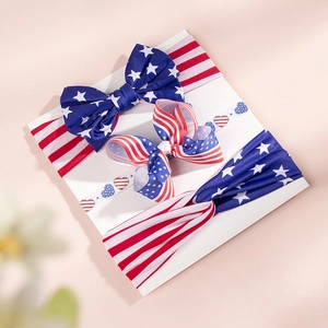 Macro detail of July 4th kids headband set with American flag stars and stripes bow