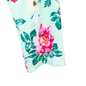 Detail of mint green floral print maternity robe cuff with durable double-needle stitching