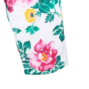 Close-up of floral print cotton fabric with double stitching on maternity robe and baby swaddle