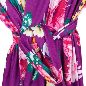 Detail shot of the waist tie and floral print on this soft maternity robe dress