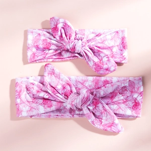 Floral print baby headband set featuring soft cotton white fabric with pink blossoms