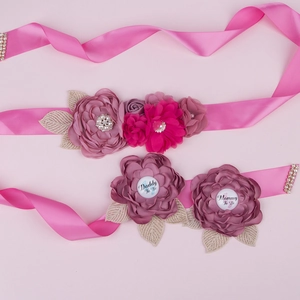 Pink maternity sash set with floral decor and Daddy to Be pins for baby shower photos