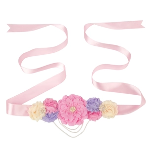Ceinture de maternité élégante avec ruban rose et fleurs colorées pour séance photo