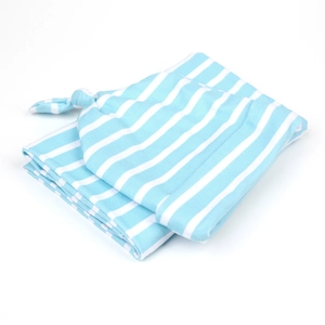 Detailed view of the striped sky blue baby swaddle set with a top knot hat on white background
