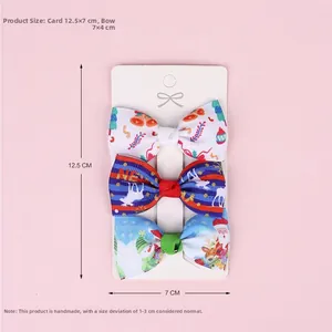 Three-piece Christmas bow hair clip set with bells, reindeer, and Santa Claus patterns