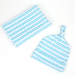 Blue and white striped baby swaddle blanket and knotted hat set for newborns