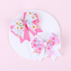 Détails des barrettes nœuds à double couche avec imprimé cœur en rose et blanc