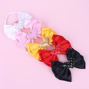 Nylon baby headbands set with triple-layered bows and rhinestone heart details