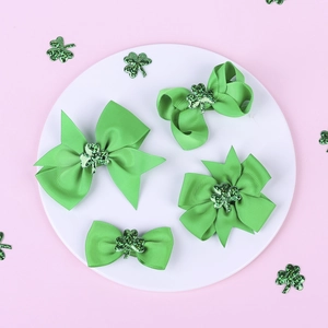Saint Patrick's Day green bow hair clips set with shamrock clover sequin decorations
