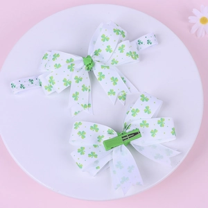Set fascia per neonati e clip a fiocco con trifoglio verde per San Patrizio