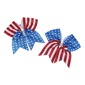 Detail of glitter flag hair bows with stars, stripes and sparkling rhinestone centers