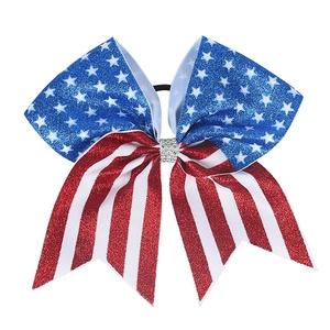 Detail of USA Independence Day cheer bow with patriotic sequins and rhinestone center