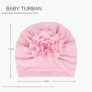 Turbante rosa neonato con grande fiore e dimensioni 20cm x 19cm in vista piana