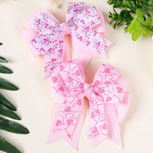 Lot de deux nœuds à cheveux roses superposés avec motifs LOVE et cœurs pour filles