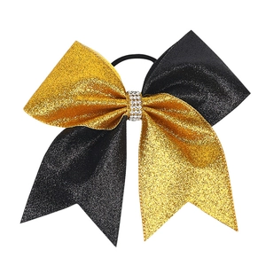 Close-up of glitter bow hair tie with rhinestone center and high elastic rubber band