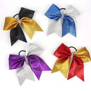 Glitter bow hair ties with rhinestone center in black gold and blue silver colors