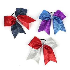 Three-piece glitter cheerleader hair bows with rhinestone centers and elastic bands