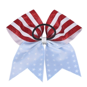 Independence Day girls large bow hair tie with American flag stars and stripes pattern