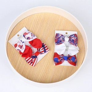 Three-piece American Independence Day hair clips on display card with red blue stars and stripes