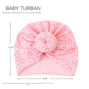 Pink baby turban hat with eyelet embroidery detail and size 19x17 cm specifications