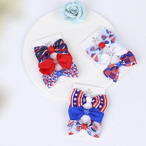 Detail of red white and blue Independence Day grosgrain ribbon hair bow clips set