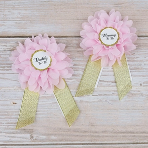 Pink and gold Baby Shower pins featuring Mommy To Be and Daddy To Be floral designs