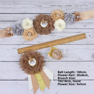 Detail of champagne floral sash set with Mommy To Be ribbon and cute bear doll for baby shower