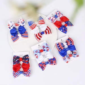 Pack of 18 Independence Day hair bows featuring American flag stars and stripes patterns