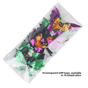 Set of 10 Halloween glitter hair clips featuring pumpkin, bat and ghost motifs in polybag