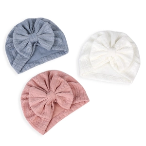 Lot de 3 bonnets turbans pour bébé avec texture chevron et nœuds géants en couleurs douces