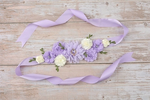 Detailed shot of handmade lavender silk maternity sash with chiffon flowers and pearls