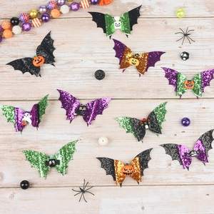 Halloween glitter bat wing hair clips set featuring pumpkin ghost and spider motifs