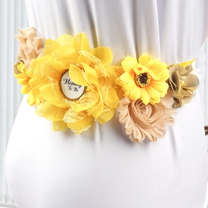 Yellow and beige flower sash with Mommy To Be badge for baby shower party for pregnant women