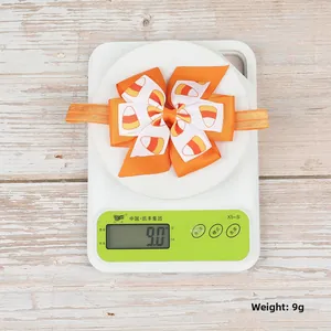 Detail of a lightweight Halloween bow headband weighing 9g on a digital scale