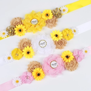 Three Mommy To Be sashes with handmade sunflower and rose fabric flowers for baby showers